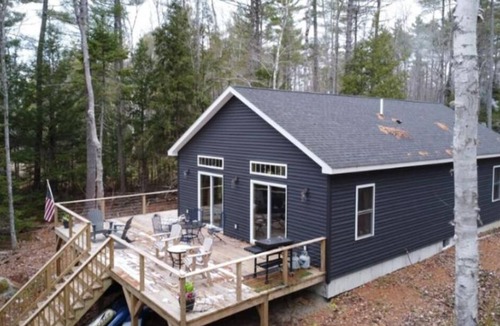 Lincoln House | Private 3-bedroom waterfront house with dock kayaks and paddle boards.