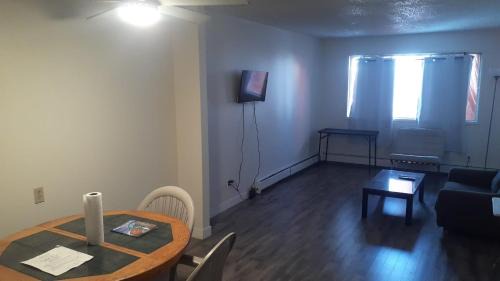 Northeast Edmonton House | Private bedroom with queen bed