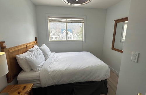 Fernie Hotel | Private Suite with Mountain Views & Living Area