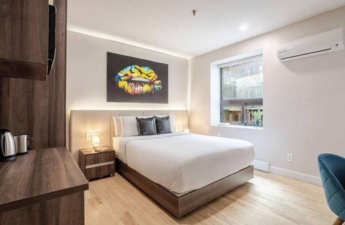 Gay Village Hotel | Queenhaus – Heart of Montreal