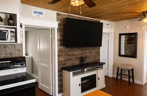 Port Rexton House | Relax at The Bonavista Branch House - Port Rexton, a cozy 2BR retreat near Skerwink Trail and Trailway. Once home to railway engineers and conductors, this updated cottage offers firepit evenings, local dining, Port Rexton Brewing, and Nfld charm.