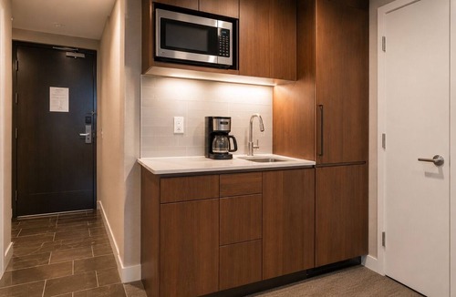 Central Waterfront Condo | Relaxing 2BR City Escape Near Entertainment & Transit!