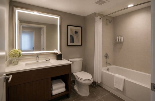Central Waterfront Condo | Relaxing 2BR City Escape Near Entertainment & Transit!
