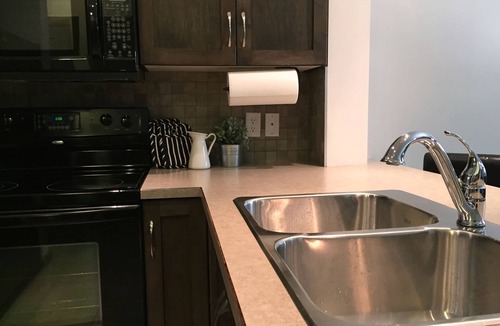 South Pandosy Condo | Relaxing Retreat Overlooking Playa's Quiet 3rd Floor Courtyard