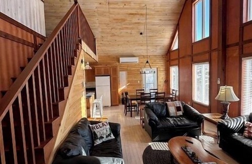 Terra Nova House | Rhodies Pondside It's ideal for guests looking to unwind, enjoy scenic views, and experience a quiet getaway.