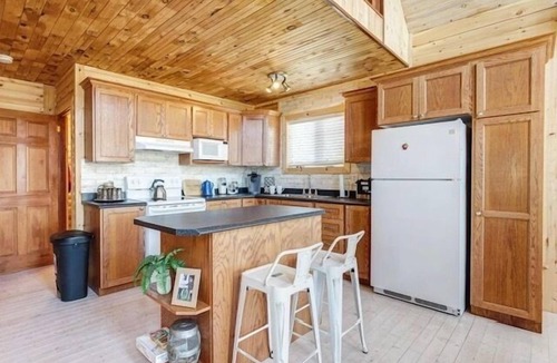 Terra Nova House | Rhodies Pondside It's ideal for guests looking to unwind, enjoy scenic views, and experience a quiet getaway.