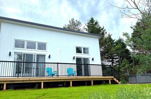 Alberton Cottage | Rivers End Retreat located on cascumpec river. Private hot tub and bunk house.