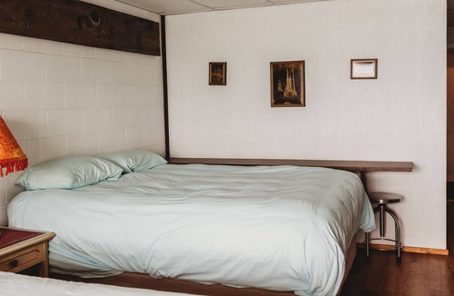 Sointula House | Room 202- Oceanfront room with balcony and two queen beds