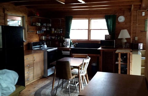 Exeter Cabin | Rustic Camping Cabin with Fireplace in Private Woods near Bangor, Maine