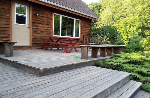 Exeter Cabin | Rustic Camping Cabin with Fireplace in Private Woods near Bangor, Maine