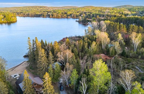 Lake St. Peter House | Rustic Waterfront Cabin with BBQ, Fire Pit and Views