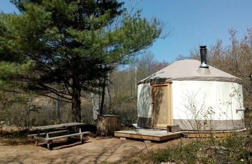 Stone Mills RV Rental | Rustic Waterfront Yurt on the Salmon River for a Peaceful Glamping Escape near Tamworth, Ontario