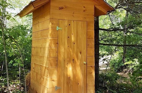 Stone Mills RV Rental | Rustic Waterfront Yurt on the Salmon River for a Peaceful Glamping Escape near Tamworth, Ontario
