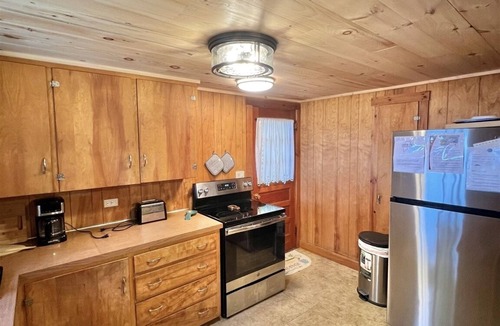 Sebago Cottage | Sebago Waterfront-Large Private Lot, Dock, Screened Porch, Grill. Pets Allowed