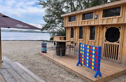 Ryerson Cottage | Secluded 6 bed, 3 bath Cottage on Doe lake! 120ft Sandy Beach! Private 4 Acres!