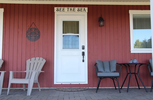 Regional District of Nanaimo Apartment | See the Sea! A beautiful, fully furnished, one bedroom, semi-oceanfront, suite!