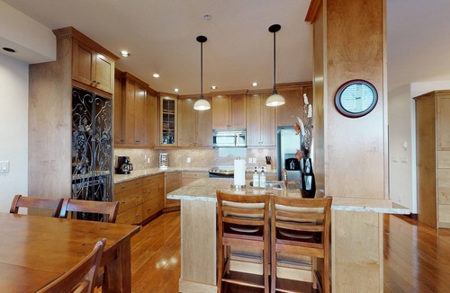 Big White Ski Resort Condo | Ski-in/out condo w/private hot tub, gas fireplace, & steam shower - mtn views