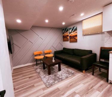 Southeast Calgary House | Spacious 2 bedroom with 2 queen beds and one sofa bed lower unit with separate entrance and parking space Near Downtown, Calgary Zoo, Costco and many more