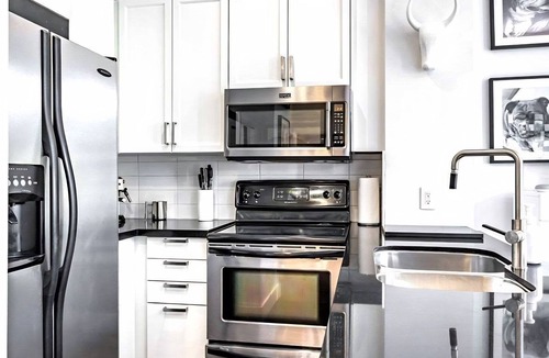 Bay Cloverhill Apartment | Spacious Downtown 1BR w/Private Terrace & BBQ Grill+ Pet-Friendly!