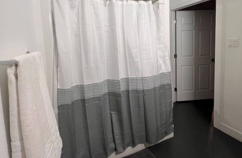 Halifax Apartment | Spacious guest suite with sitting area