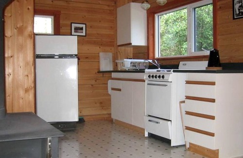 Whitehorse House | Spacious Log Cabin near Mountains and Little Atlin Lake in Yukon, Canada