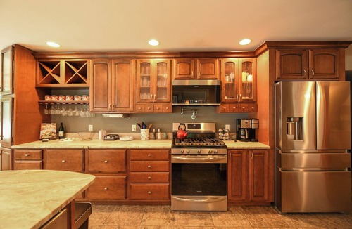 Raymond House | Spacious Luxury Retreat on Raymond Pond | Game Room & Private Dock