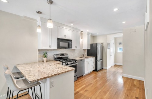 Allston House | Sparkling Boston Townhome with AC, Parking, Roku TV, Patio, Pet Friendly!