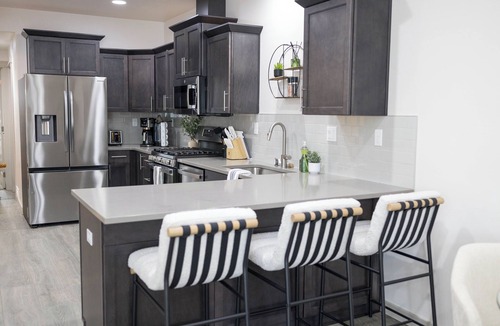 Sunset House | Stay in Boise’s coveted North End! This 3BR/2BA retreat with Hot Tub and Walking distance to Hyde Park and Camel’s Back Park close to Boise White Water park. E Bikes For Rent