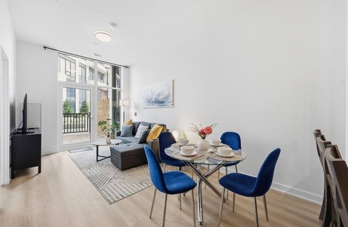 Kitchener Apartment | Stylish 2BR in Station Park | Private Patio + Spa, Gym & Bowling