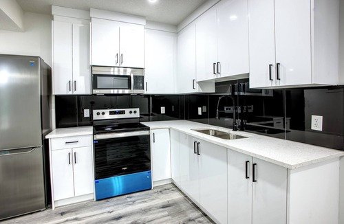 Southeast Calgary Apartment | Stylish Basement Suite w/Private Entry & Workspace