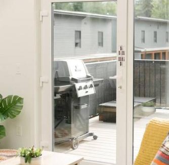 Revelstoke House | The Nest - Condo with Hot Tub & BBQ