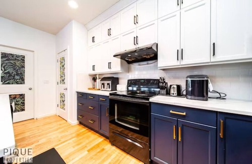 Griesbach House | The Obsolete Suite - HotTub - King Bed - AC - Pet Friendly