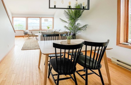 East River Point House | The oceanside Hideaway is nestled between the trees with stunning ocean views