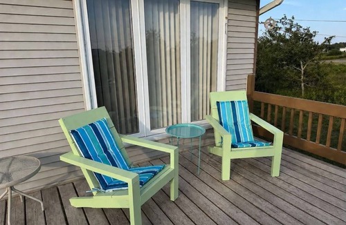 Chiasson Cottage | The Swallow's Nest: cozy cottage, steps to the beach, kite surfing & bike trails