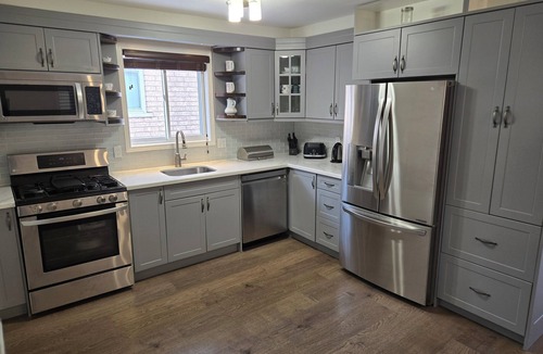 Burlington House | Two bedroom home next to golf course & a variety of restaurants