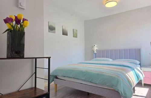 Killarney House | Vancouver Family Suite The first floor features a separate entrance two bedrooms and a private bathroom creating a family-style suite