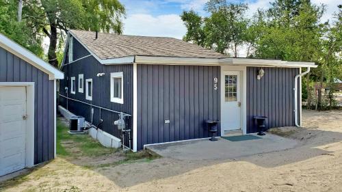 Wasaga Beach House | Wasaga Beach 1 - Walk to Main Beach - Riverfront - Sleeps 10 - 95 Mosley St