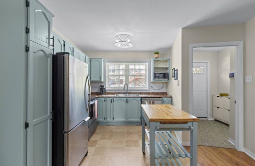 Downtown St. John's House | Welcome to The Crossing, a thoughtfully restored 3-bedroom home on a quiet residential street in historic St. John's. Enjoy free off-street parking, a private fenced yard, and all the comforts of home—just minutes from the best of St. John's.