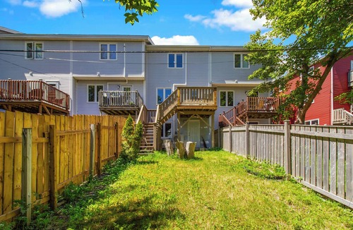 Downtown St. John's House | Welcome to The Crossing, a thoughtfully restored 3-bedroom home on a quiet residential street in historic St. John's. Enjoy free off-street parking, a private fenced yard, and all the comforts of home—just minutes from the best of St. John's.