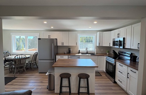 Lepreau House | Welcome to the Falls House—your front-row seat to the beauty of Lepreau Falls