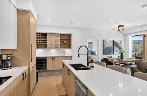 Central Okanagan Condo | Welcome to Zara at Lakestone! A premier lakeside community for a peaceful escape with pickleball court, gym & sauna. Experience curated luxury in this 3BR retreat with a king suite, 2.5 baths, and gourmet kitchen with scenic views—near Okanagan Lake