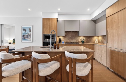Central Okanagan Condo | Welcome to Zara at Lakestone! A premier lakeside community for a peaceful escape with pickleball courts, gym, & sauna. Relax in a stylish condo retreat at Zara Lakestone. Features: private patio w/BBQ & workspace.