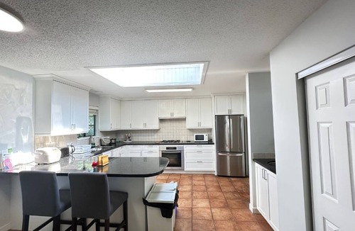 Dundarave House | West Van Lodge. private bedroom , but shared washroom , kitchen & living area.