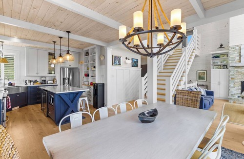 Whitbourne House | Where unforgettable weekends begin. Gather with family and friends in this spacious waterfront Lake house featuring a hot tub, stunning sunset views, and room for everyone to reconnect and celebrate.