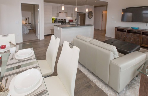 Saanich West Condo | WOW! Floor to Ceiling Windows, Mountain And Lake Views