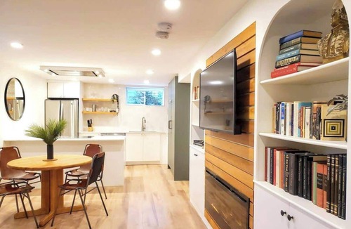 Burnaby House | Your modern Northwest Hideaway Suite with cozy fireplace