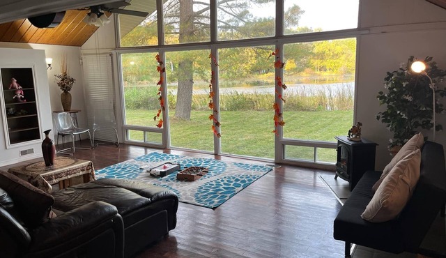 4-season chalet middle of nature on the edge of private lake with panorama view