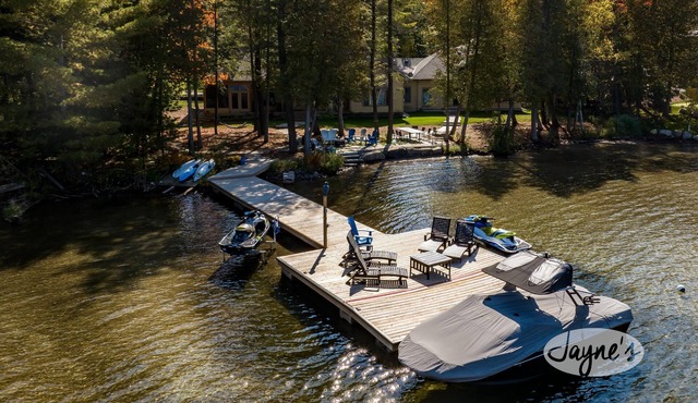 8 bed 7 bath renovated cottage on South Lake Joseph! Shallow, sandy walk in!