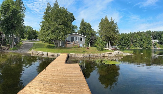 Beautiful lakefront cottage steps from the clear waters of spring fed Black Lake