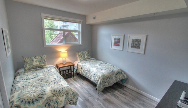 Beautiful Pool Level Walk Out Condo in Downtown Kelowna